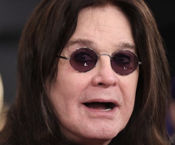 ozzy osbourne arriving at an awards show 