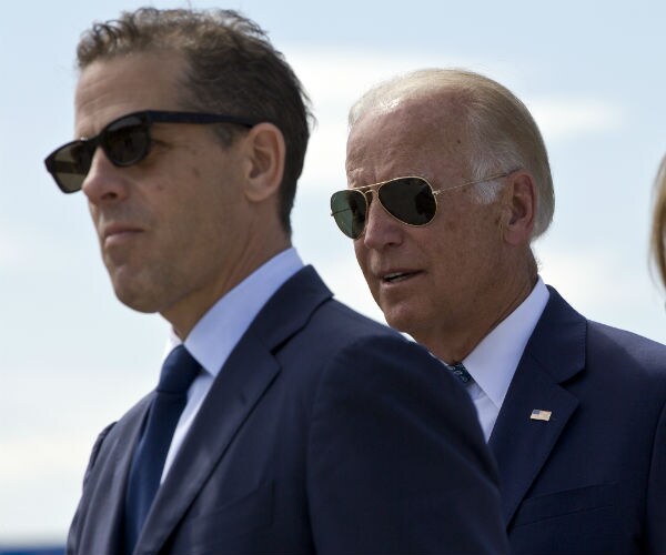 hunter biden wearing sunglasses with his father, joe biden, also wearing sunglasses 