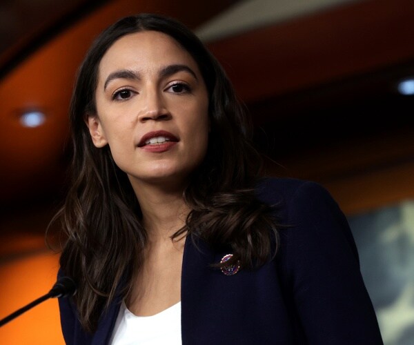 Alexandria Ocasio-Cortez speaks during a news conference 