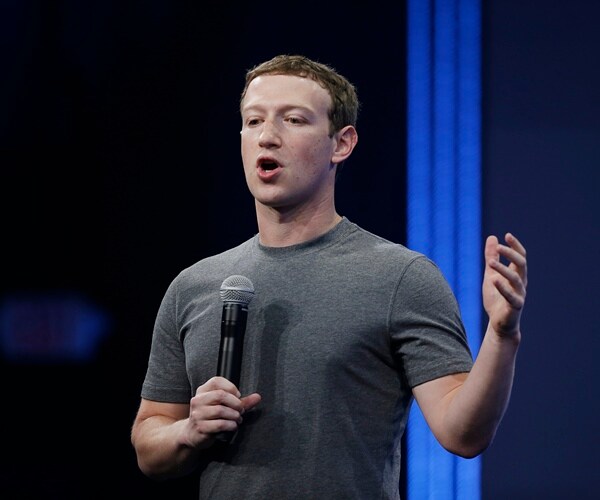 Embattled Facebook CEO Zuckerberg Seeks to Mend Fences in DC