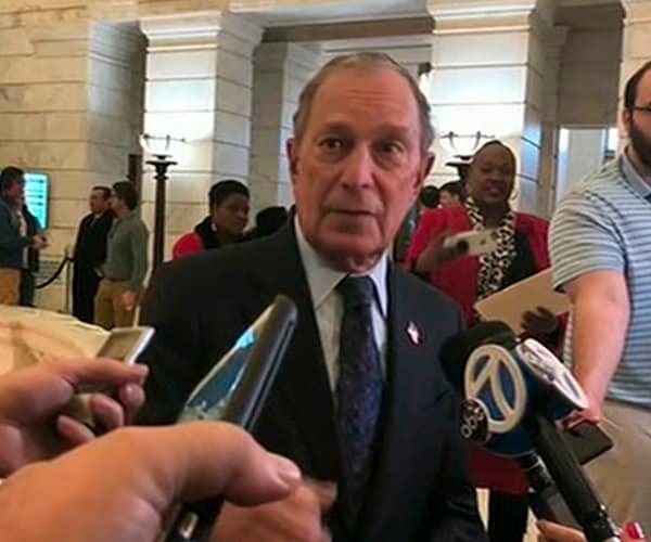 michael bloomberg speaks with reporters in arkansas