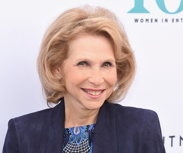 shari redstone stands on red carpet