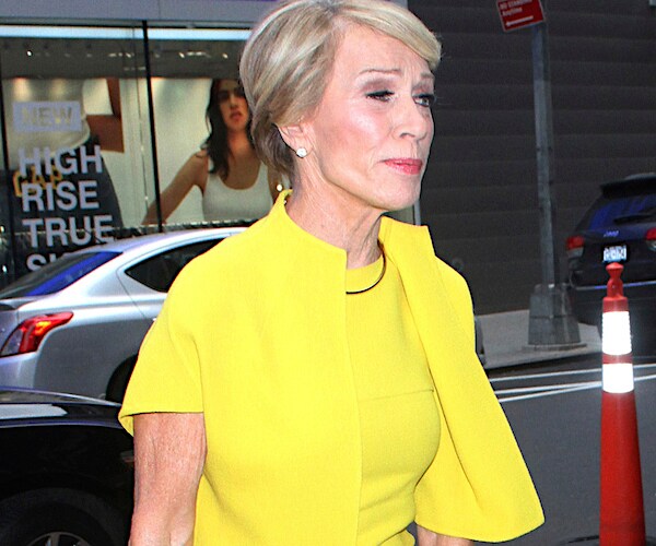 "Shark Tank" millionaire Barbara Corcoran wears yellow as she crosses the street