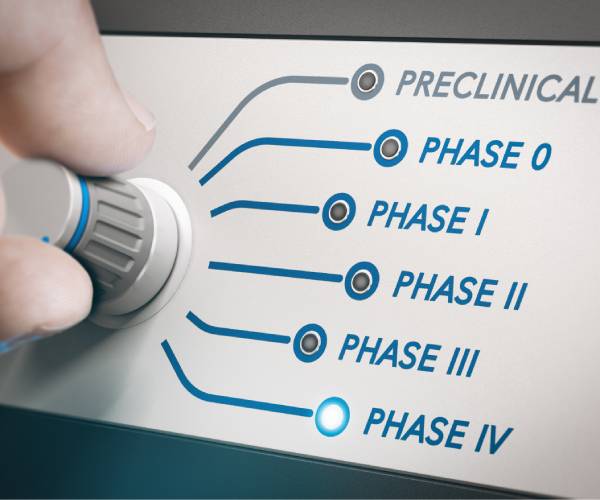 hand turning knob to select phases of vaccine clinical trial