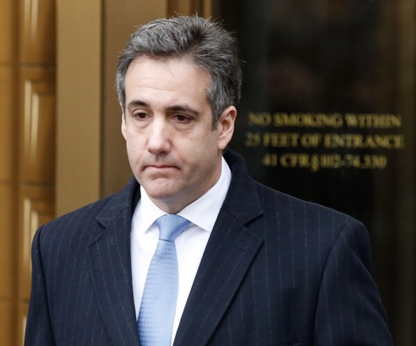 michael cohen walking out of court