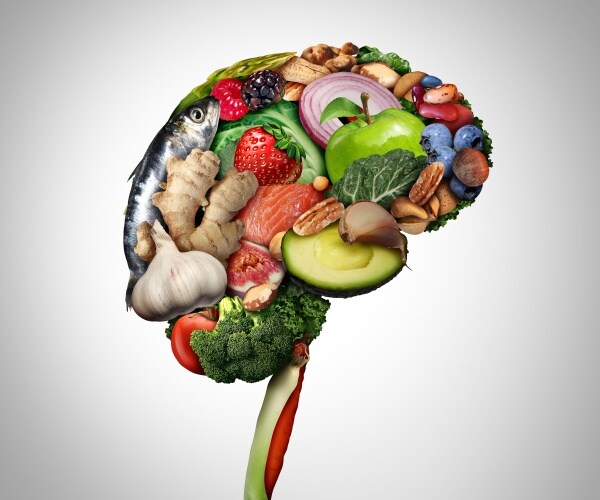 fruits, veggies, berries, omega-3 rich foods all in the shape of a brain