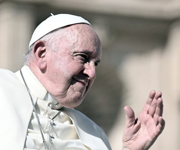 Pope Francis shows slight improvement in hospital after pneumonia diagnosis