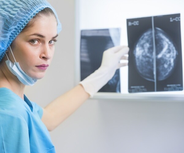 doctor reviewing mammogram results