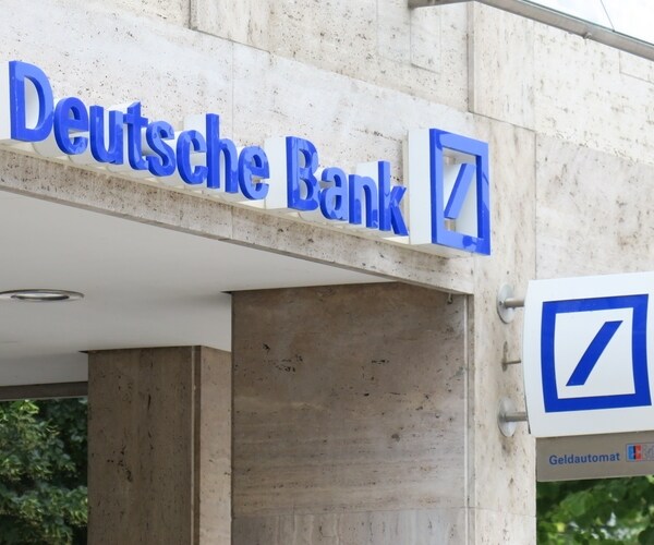 signs on a deutsche bank building

