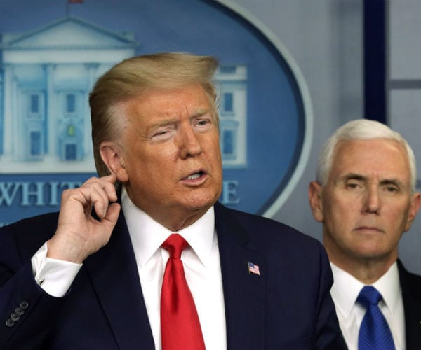 donald trump is shown with mike pence in the background at the white house