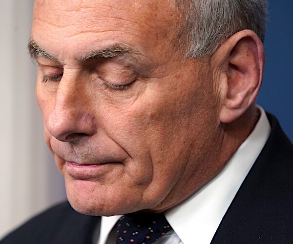 former white house chief of staff john kelly looks down exasperatingly