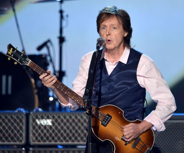 paul mccartney performs at a concert