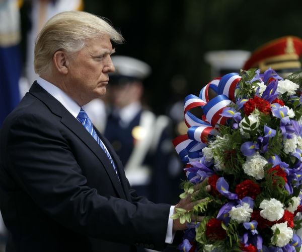 Trump Hails the Fallen and Their Families at Arlington