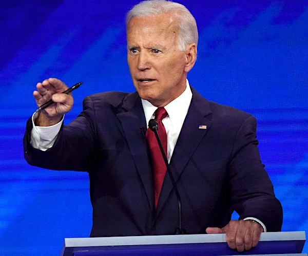 joe biden points and speaks during the democratic presidential primary