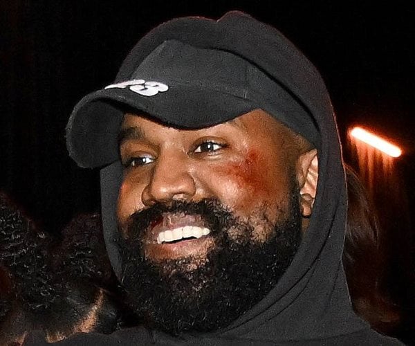 kanye west smiles