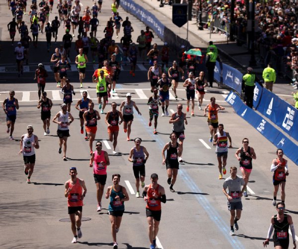 boston marathon runners competing