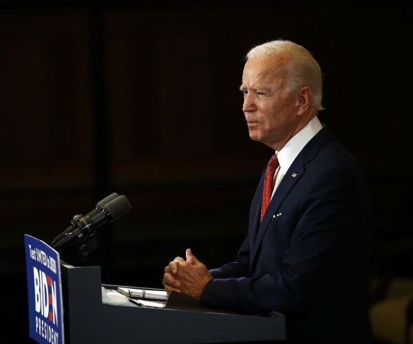 joe biden is shown giving a speech in philadelphia