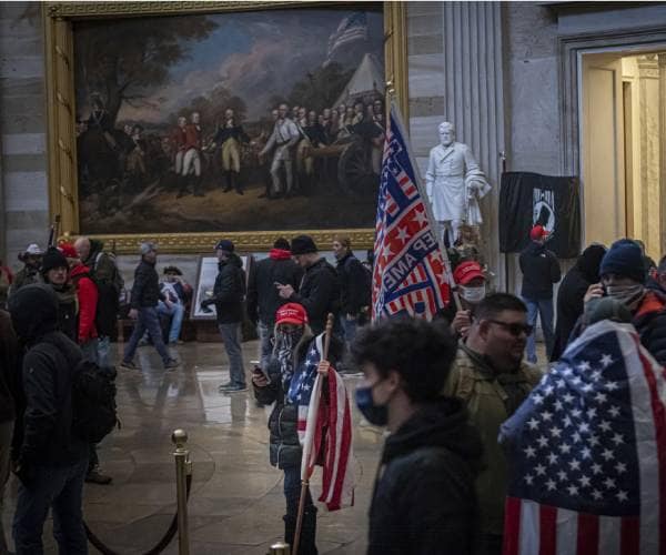 people walking inside the capitol building