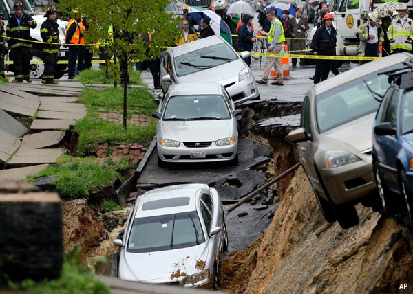 Baltimore Sinkhole Swallows Cars, Forces Residents From Homes