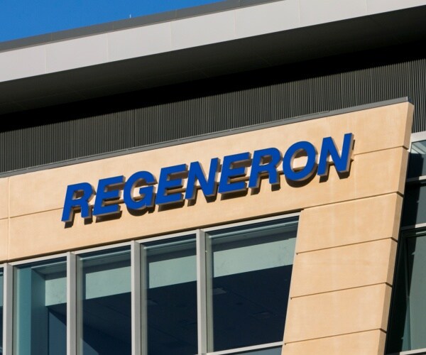 a logo sign outside of the headquarters of regeneron pharmaceuticals, inc.