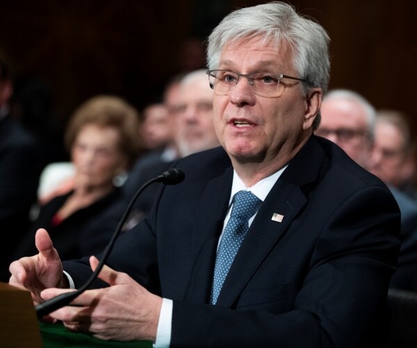 Federal Reserve Governor Christopher Waller testifying