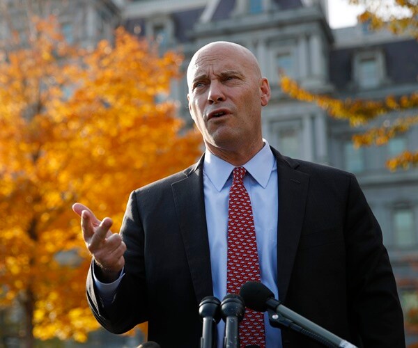 marc short speaks outside on a beautiful fall day