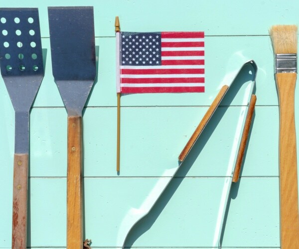 American flag and grilling tools