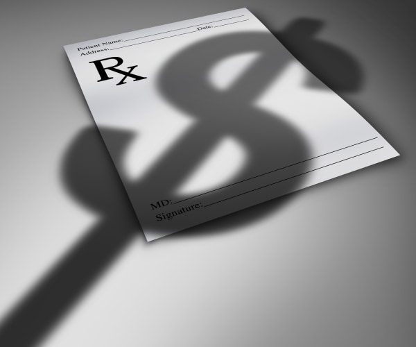 dollar sign shadow on prescription pad