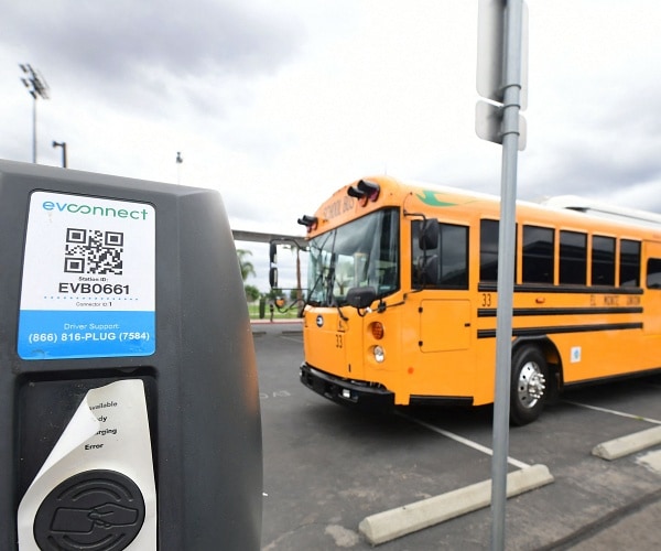 electric school bus plugged in 