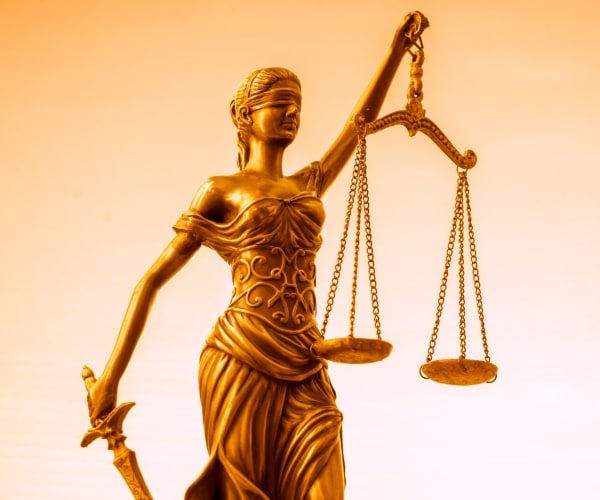 scales of justice in gold