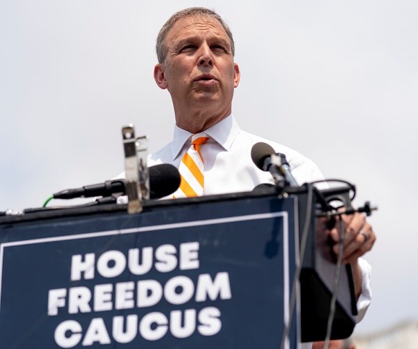 scott perry speaks at press conference outside capitol 