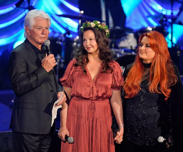 larry strickland, ashley judd and wynonna judd speak at a celebration service for Naomi Judd