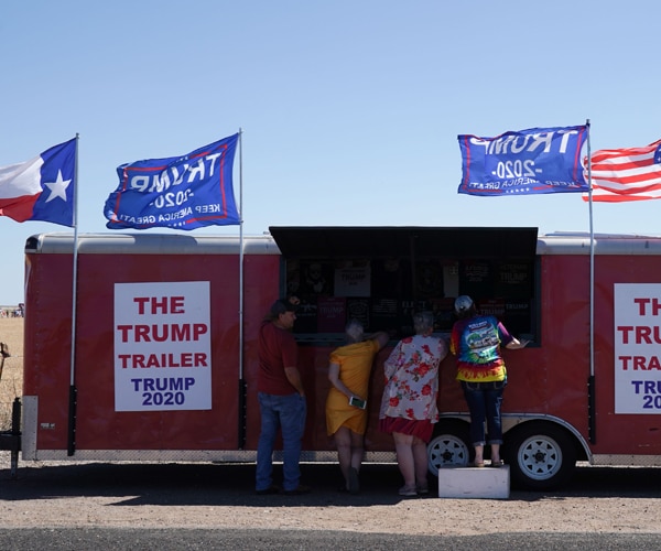 a vendor selling trump campaign merchandise in texas