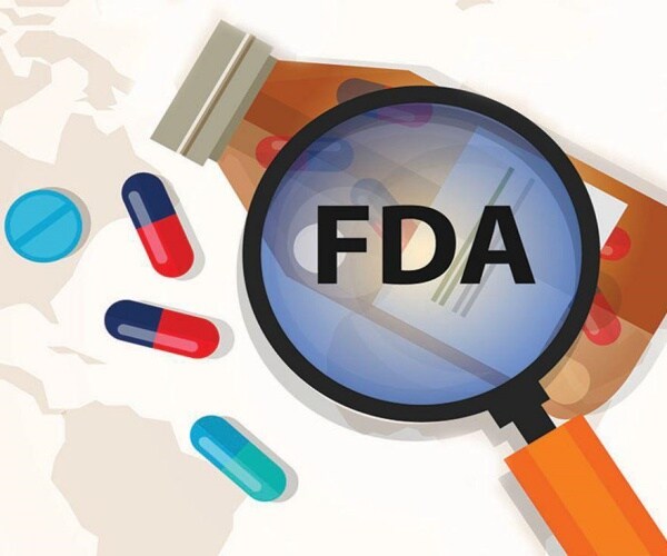 illustration of FDA, magnifying glass, pill