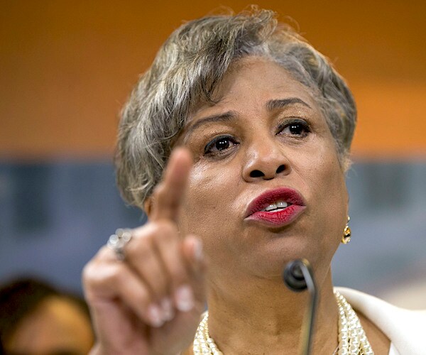 brenda lawrence sits, gestures, and remarks during a house committee hearing