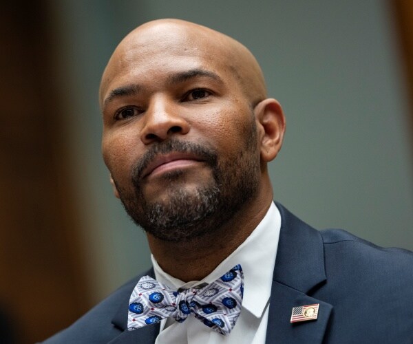 jerome adams looks on