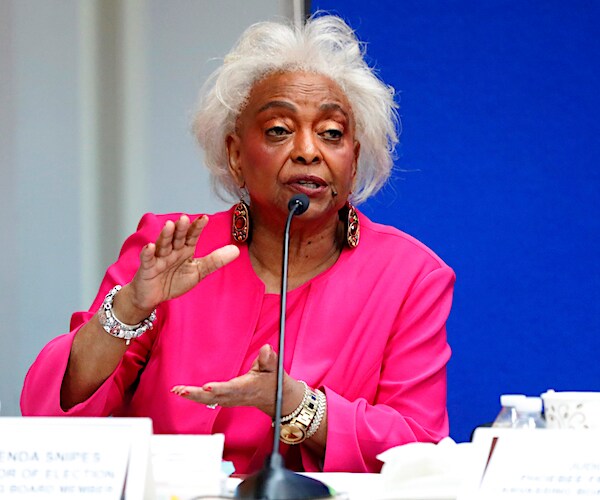 broward county supervisor of elections brenda snipes gestures with her hands making a stack during a news conference