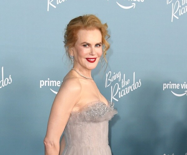 nicole kidman stands on red carpet