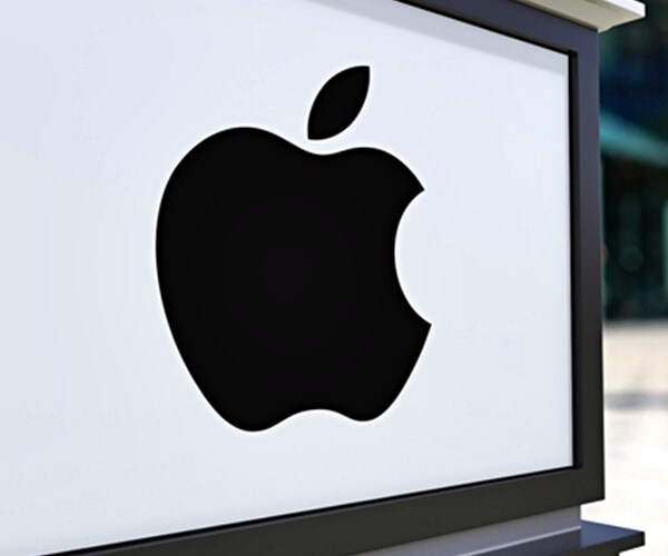 street signage board with apple inc. logo. blurred office center and walking people background. 

