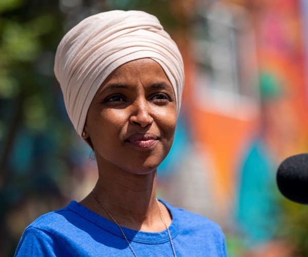 rep ilhan omar speaks with the media