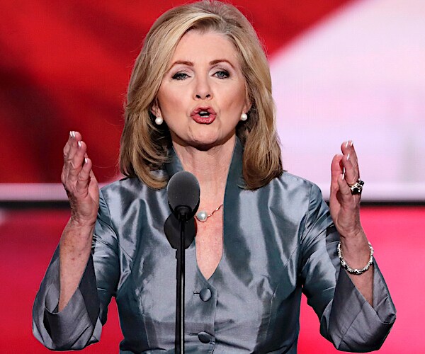 tennessee republican representative marsha blackburn raises both hands for a republican national convention speech