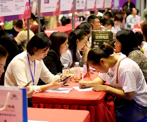 Jobs at Risk as China's Services Sector Feels Heat of Trade War