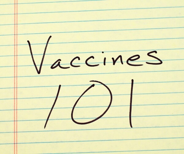 "Vaccines 101" written on yellow legal pad