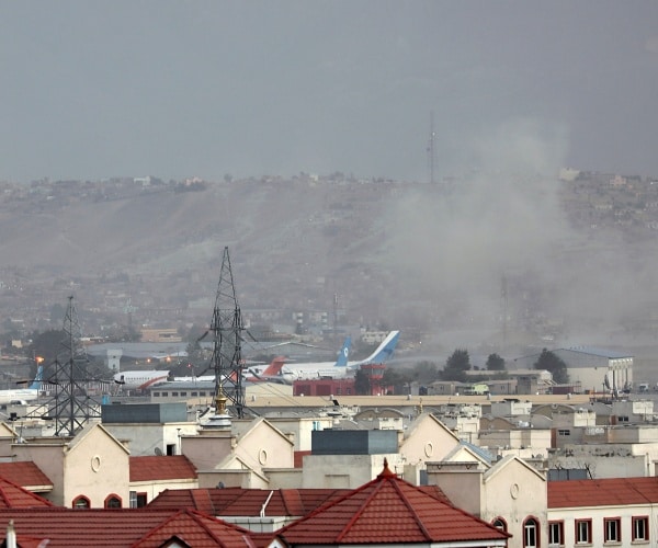 smoke rises at airport