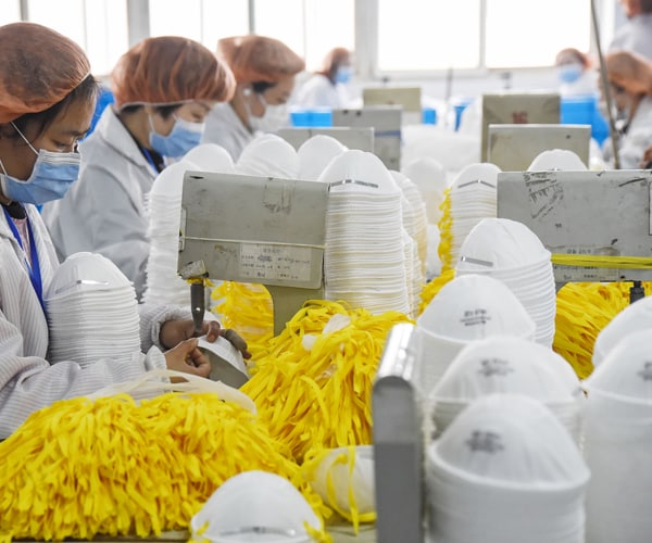 workers make medical face masks in handan china