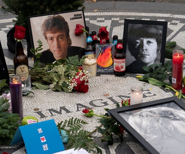 mementos left at strawberry fields in central park to remember john lennon