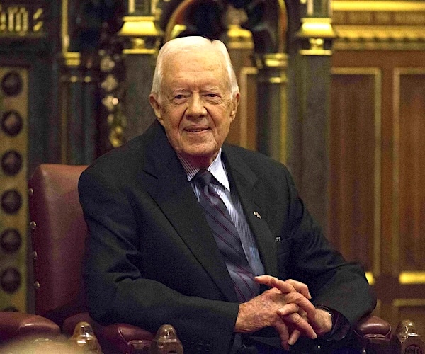 jimmy carter poses for a portrait