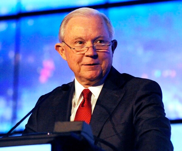 jeff sessions speaks to a business group