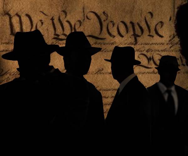 a group of spies in front ot the constitution