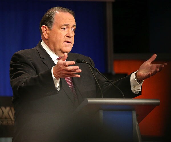 Huckabee: Taxes Like Training Dogs, Raising Kids, Reward Good Behavior